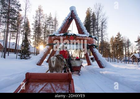 Reindeer sled tour in Santa Claus Village, in Rovaniemi, Lapland Finland Stock Photo