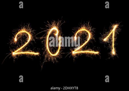 Happy new year. Digits 2021 made from fireworks isolated on black background. Stock Photo