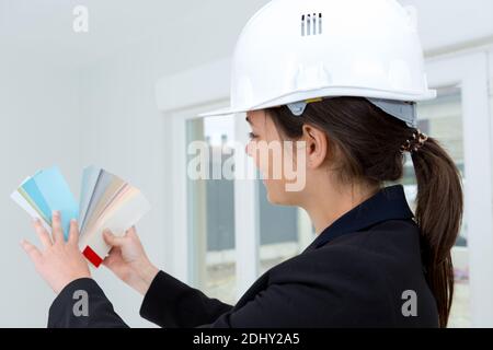 confident interior designer using color swatches Stock Photo
