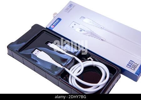 white Android and iPhone Charger Cable Stock Photo