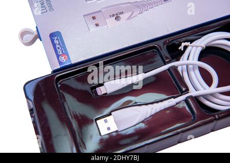 white Android and iPhone Charger Cable Stock Photo