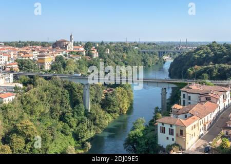 Trezzo sull'Adda (MI) , ITALY - September 5, 2020. Aerial view river trezzo and the bridge. Vegetation and industrialization. Stock Photo