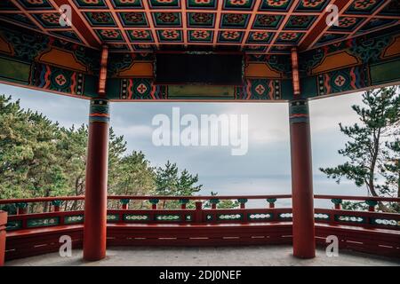 Haewoljeong Korean traditional pavilion and ocean view at Haeundae Dalmaji-gil Moontan Road in Busan, Korea Stock Photo