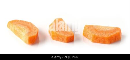 fresh raw peeled carrot slices macro isolated on white background Stock Photo