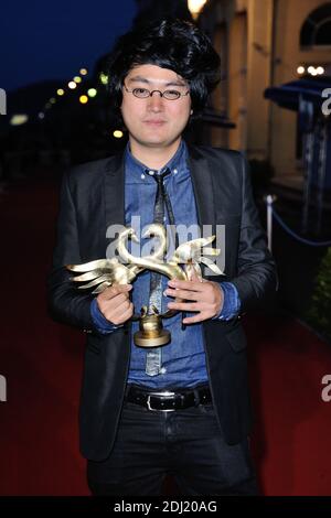 Davy Chou assiste au tapis rouge des gagnants des Cygnes d'Or lors du 30eme Festival du Film de Cabourg a Cabourg, France le 11 Juin 2016. Photo by Aurore Marechal/ABACAPRESS.COM Stock Photo