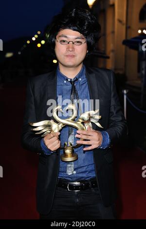 Davy Chou assiste au tapis rouge des gagnants des Cygnes d'Or lors du 30eme Festival du Film de Cabourg a Cabourg, France le 11 Juin 2016. Photo by Aurore Marechal/ABACAPRESS.COM Stock Photo