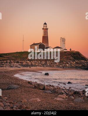 The Montauk Lighthouse at sunset, at Montauk Point State Park, in the Hamptons, Long Island, New York Stock Photo