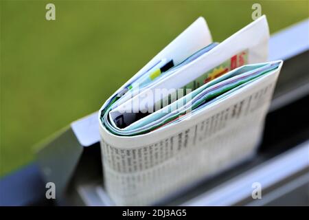 stack of books on blue background Stock Photo