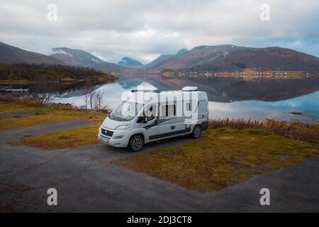 Campervan parked in the parking lot at Fjordbotn Camping, Senja, Norway Stock Photo