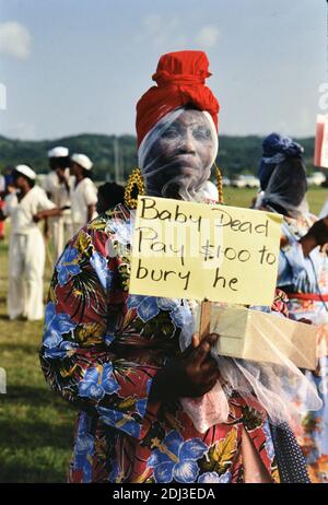 1990s Trinidad and Tobago - Tobago Heritage Festival performer begging for money to bury her baby ca. late 1990s Stock Photo