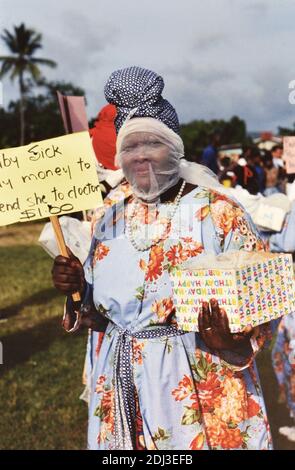 1990s Trinidad and Tobago - Tobago Heritage Festival performer begging for money to bury her baby ca. late 1990s Stock Photo