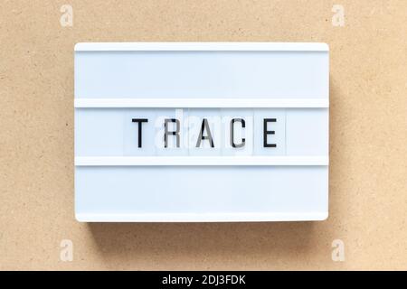 White lightbox with word trace on wood background Stock Photo