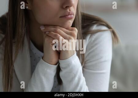 Close up frustrated young woman worried about problems Stock Photo