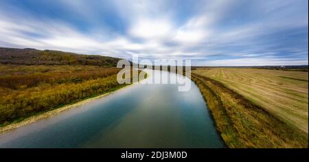 Flight over autumn mountain river, colorful leaves and stream Striy in Carpatian mountains Stock Photo