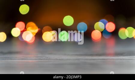 Festive multicolored bokeh background. Blurred lights of led garland. Copy space. Stock Photo