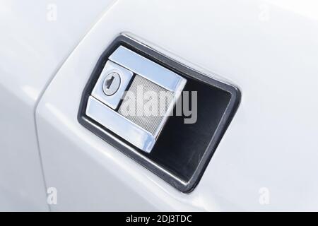 Close up detail of the door handle latch of a white classic Lamborghini Silhouette 1970s sports coupe Stock Photo