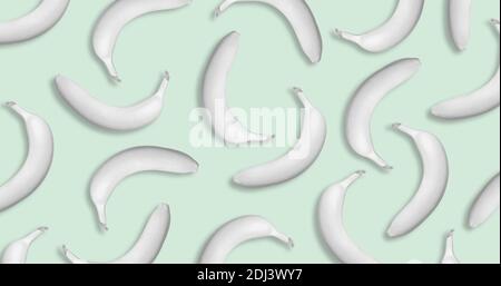 Pattern of white tropical bananas on blue and green background. Creative minimal art concept. Vector illustration. Stock Photo