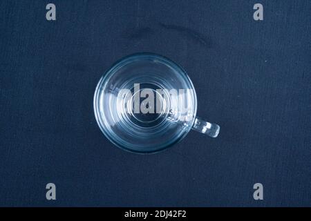 Empty glass on black background with mirroring Stock Photo