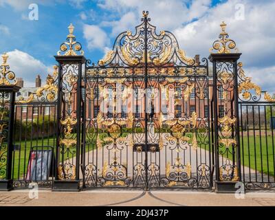 London, UK, April 11, 2010 : Kensington Palace gates in Kensington Gardens which where designed by Sir Christopher Wren for William III in 1689 and is Stock Photo