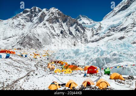 Bright yellow tents in Mount Everest Base Camp, Khumbu glacier and mountains, Sagarmatha national park, Nepal, Himalayas Stock Photo