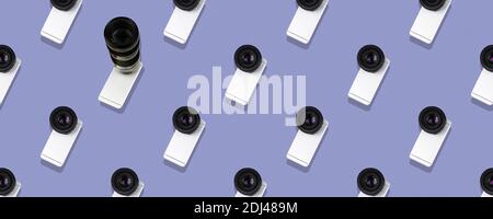Seamless flat pattern, smartphone with a big camera from a DSLR on a beautiful pastel background, banner photo Stock Photo