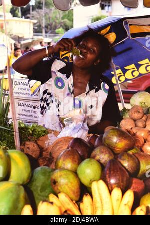 1990s St. Lucia (Eastern Caribbean) -  Castries outdoor fruit market vendor ca. 1997 Stock Photo