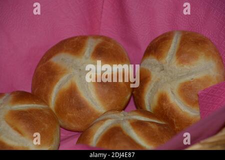 breakfast bread rolls golden baked on napkin vegetarian food Stock Photo