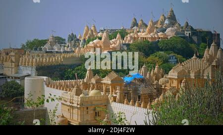 Some of the intricately carved marble shrines making up the temple complex at Palitana, a sacred site in Jainism that attracts pilgrims from worldwide Stock Photo