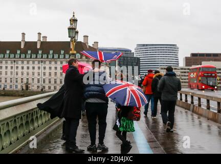 London, Britain. 13th Dec, 2020. People walk along the Westminster Bridge in London, Britain, Dec. 13, 2020. European Commission President Ursula von der Leyen said Sunday that the European Union (EU) and UK negotiating teams have been mandated to continue the post-Brexit trade talks beyond the end of this weekend. Credit: Han Yan/Xinhua/Alamy Live News Stock Photo