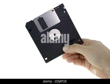 Floppy disk in human hand isolated on white background with clipping path Stock Photo