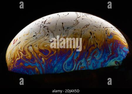 Soap bubble abstract on a black background Stock Photo