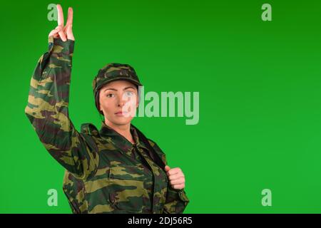 PORTRAIT OF INDIAN SOLDIER DRESSED IN UNIFORM FLASHING A VICTORY SIGN Stock  Photo - Alamy