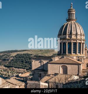 The dome of the cathedral of San Giorgio  against the landscape. Ragusa, Sicily, Italy. Stock Photo