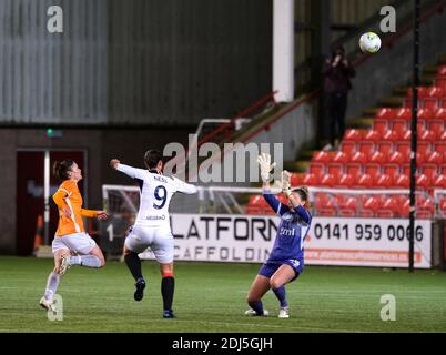 Cumbernauld, UK. 13th Dec, 2020. Zoe Ness of Rangers scores with a lob over Glasgow City goalkeeper Lee Alexander to make it 0-3 during the Scottish Women's Premier League 1 match at Broadwood Stadium in Cumbernauld, Scotland. Alex Todd/SPP Credit: SPP Sport Press Photo. /Alamy Live News Stock Photo