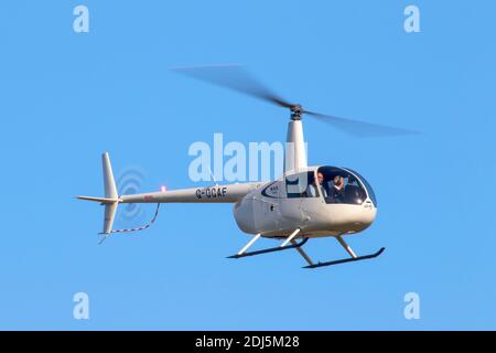 Robinson R4 Robinson R44 helicopter at Wellesbourne Airfield Warwickshire England ...