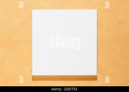 Blank square artistic canvas on the wall close-up Stock Photo