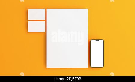 Stationery branding mockup on a yellow background to insert your design. Flat lay style. Stock Photo