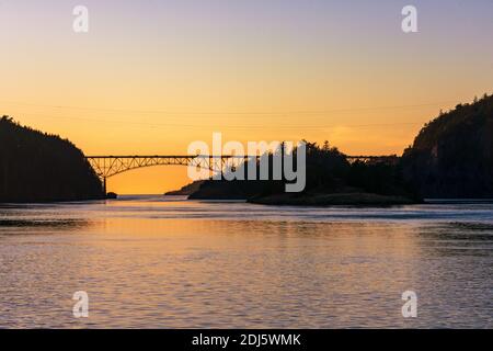 Deception Pass Bridge silhouetted at Sunset, Whidbey Island, Washington Stock Photo