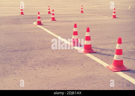 Red cones on a driving training and parallel parking area Stock Photo