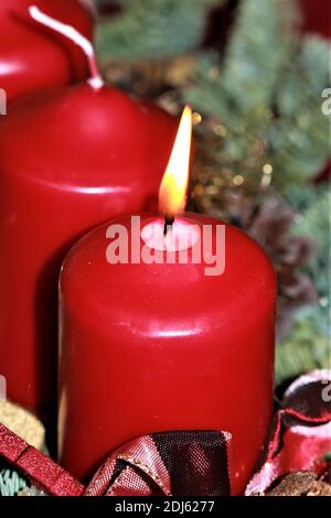 close up of an Advent arrangement with one burning candle Stock Photo