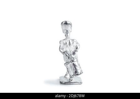 Image of handmade unpainted tin soldier on the white background Stock Photo