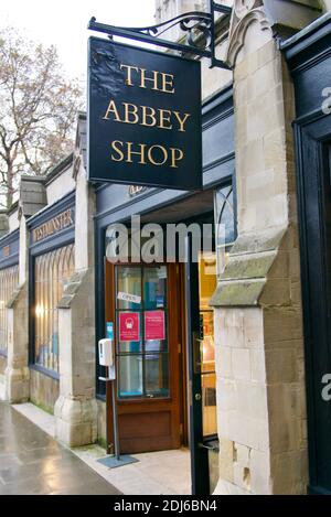 Westminster Abbey Shop front window with doors open but no customers on a weekend in December 2020. Christian shop selling religious books & souvenirs Stock Photo