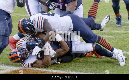 Chicago, United States. 13th Dec, 2020. Chicago Bears outside linebacker Khalil Mack (52) and Chicago Bears inside linebacker Roquan Smith (58) take down Houston Texans quarterback Deshaun Watson (4) for a second quarter safety at Soldier Field in Chicago on Sunday, December 13, 2020. Photo by Mark Black/UPI Credit: UPI/Alamy Live News Stock Photo
