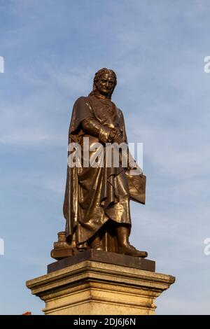 Statue of Sir Isaac Newton in front of the Guildhall Arts Centre, St Peters Hill, Grantham, Lincolnshire, UK. Stock Photo