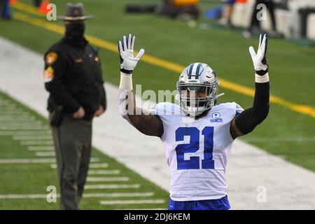 Cincinnati, OH, USA. 13th Dec, 2020. Cincinnati Bengals strong safety Vonn  Bell #24 tackles Dallas Cowboys running back Ezekiel Elliott #21 during NFL  football game action between the Dallas Cowboys and the