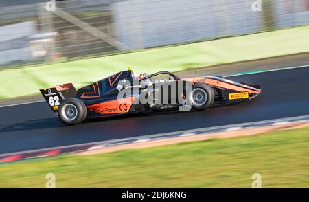 Racing car single seater modern formula in action close up blurred motion background Stock Photo