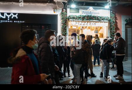 Naples, Italy. 13th Dec, 2020. Napoli is for the first time out of the red zone. This is the first Saturday evening in orange zone. (Photo by Vincenzo Noletto/Pacific Press) Credit: Pacific Press Media Production Corp./Alamy Live News Stock Photo