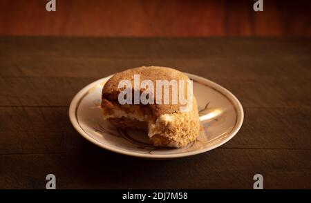 Soft chocolate cookies with marshmallow filling. toning. cookies on a plate Stock Photo