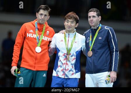 Silver medal Geza Imre, gold medal Sangyoung Park and bronze medal Gauthier Grumier at the Epee men's individual final during the 2016 Rio Olympic Games on August 9, 2016 in Rio De Janeiro, Brazil. Photo by Lionel Hahn/ABACAPRESS.COM Stock Photo