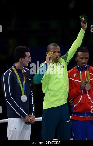 Silver medalist Sofiane Oumiha of France, gold medalist Robson Conceicao of Brazil stand on the podium during the medal ceremony for the Men's Light (60kg) boxing event on Day 11 of the Rio 2016 Olympic Games at Riocentro - Pavilion 6 on August 16, 2016 in Rio de Janeiro, Brazil. Photo by Lionel Hahn/ABACAPRESS.COM Stock Photo